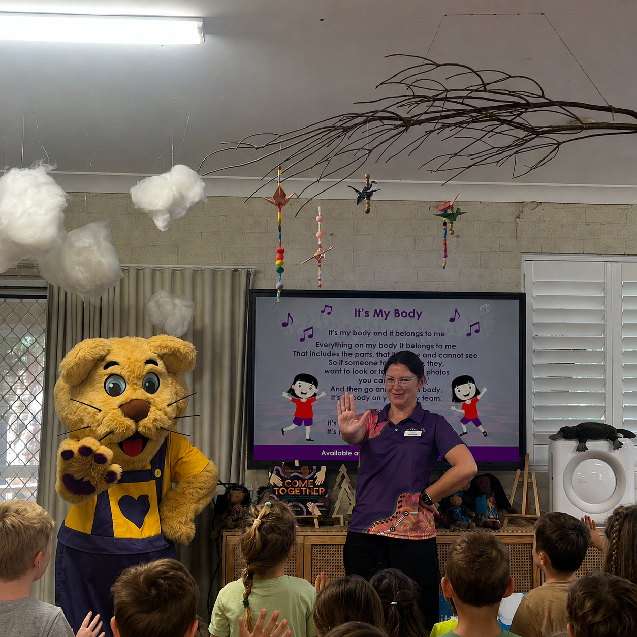 Lakeview educator supporting children in a safe and nurturing environment